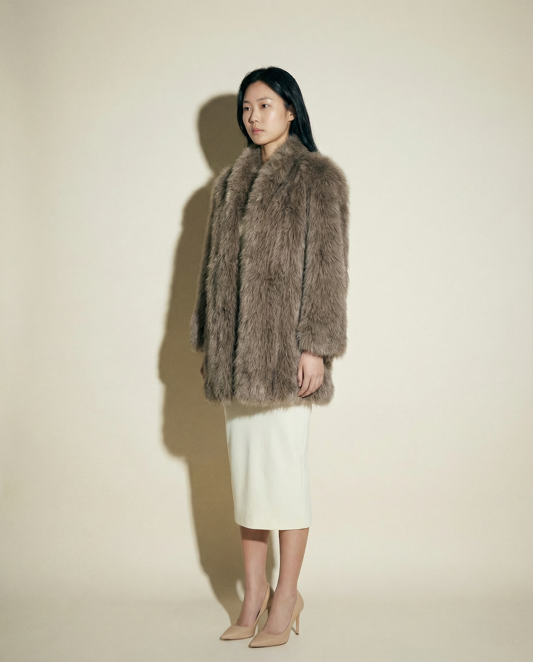 Oversized vintage fur coat with multi tonal grey and brown hues and wide shawl collar