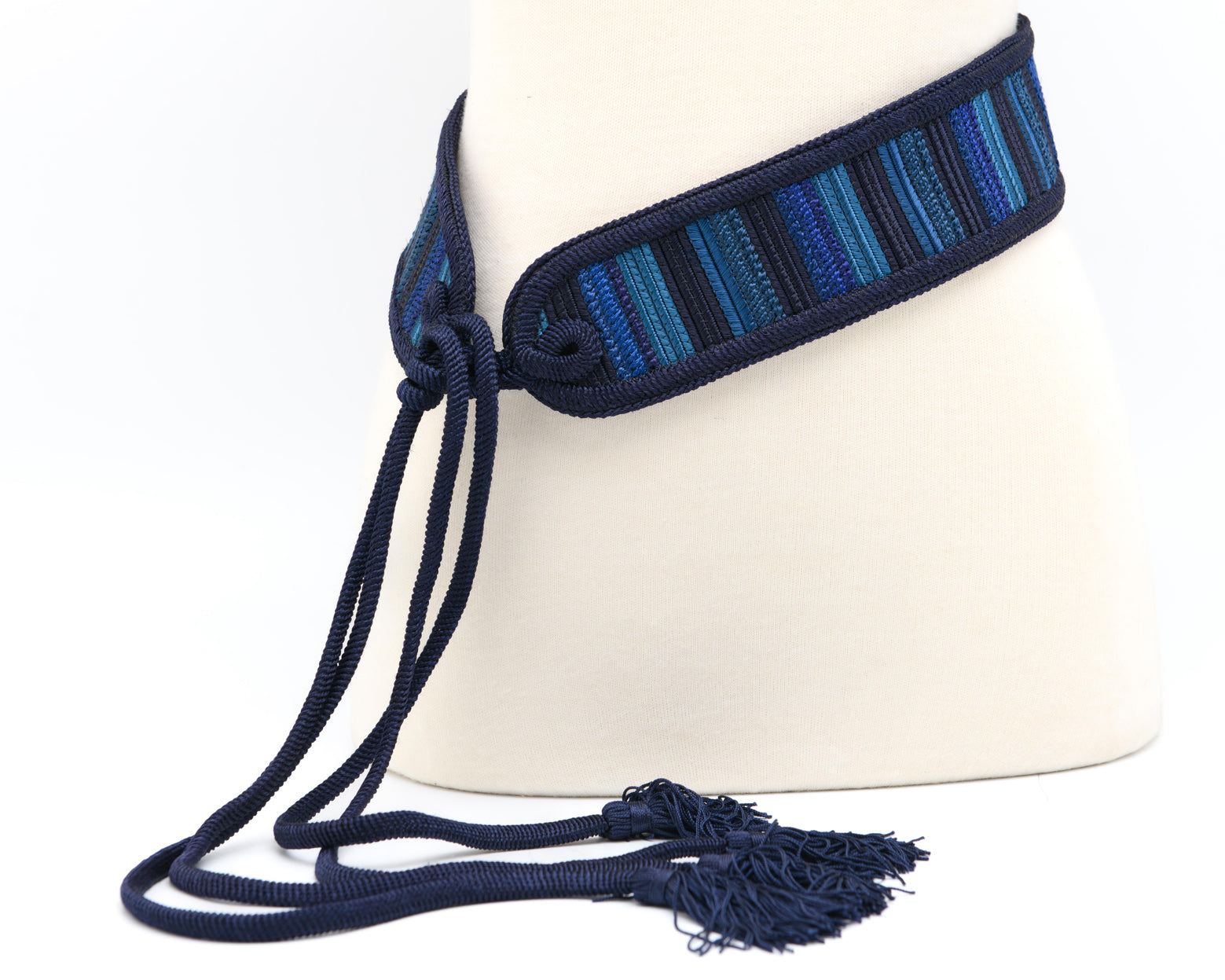 Woven blue waist belt with striped texture and adjustable tie fastening with tassels vintage accessory