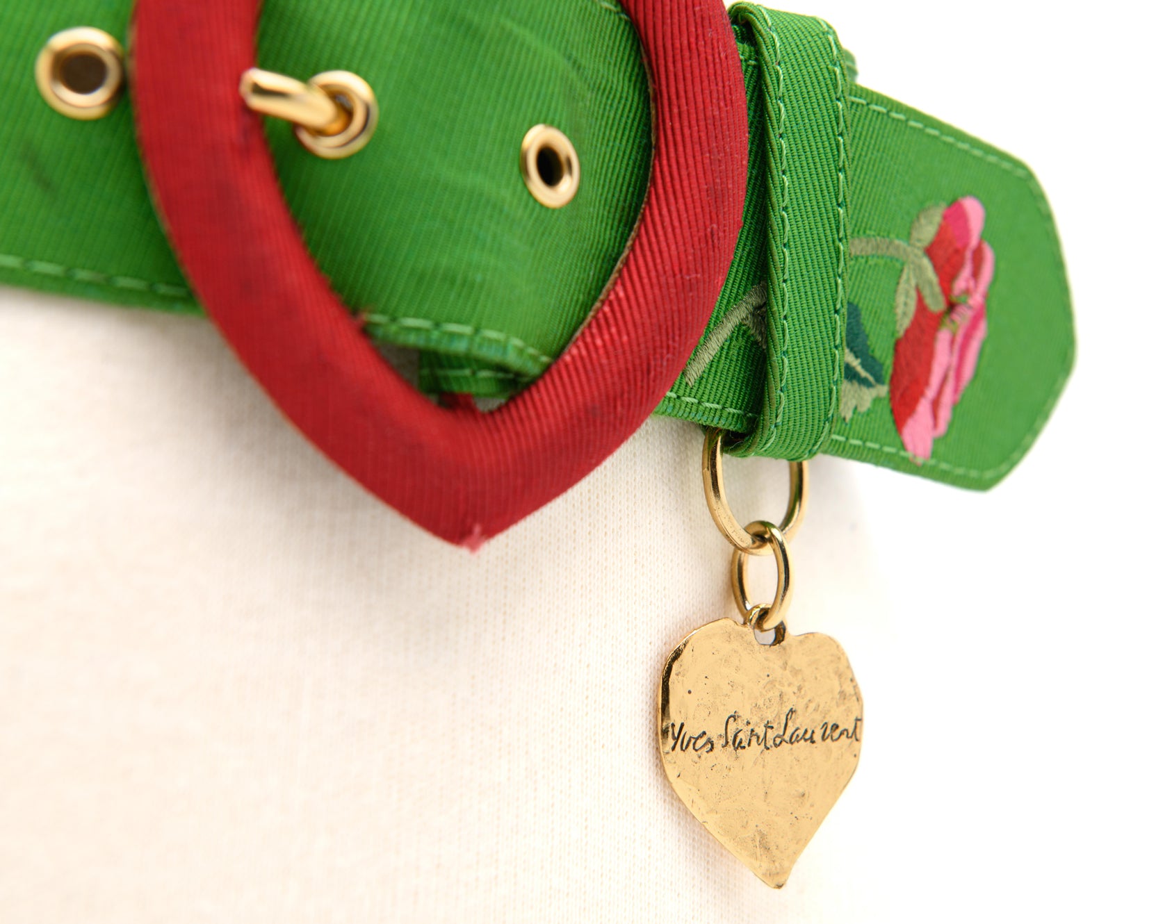 Vintage YSL Love belt with red heart buckle and engraved gold charm statement accessory Mezzanotte Madrid