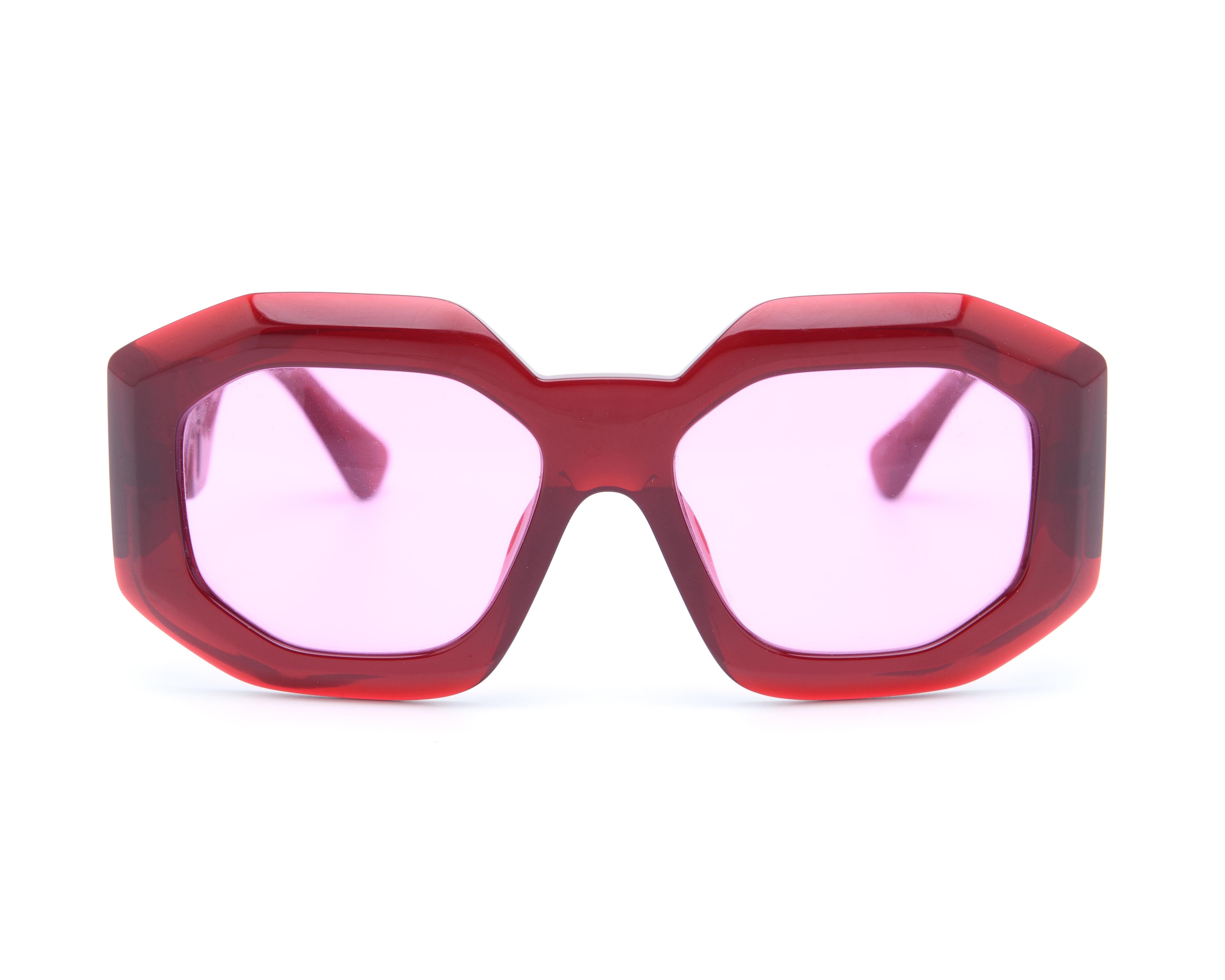 Red oversized Versace sunglasses with Medusa temple detail and pink lenses | bold statement eyewear