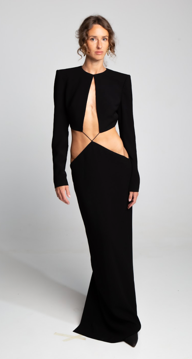 Black evening dress with sculptural waist cut-outs and fitted shape