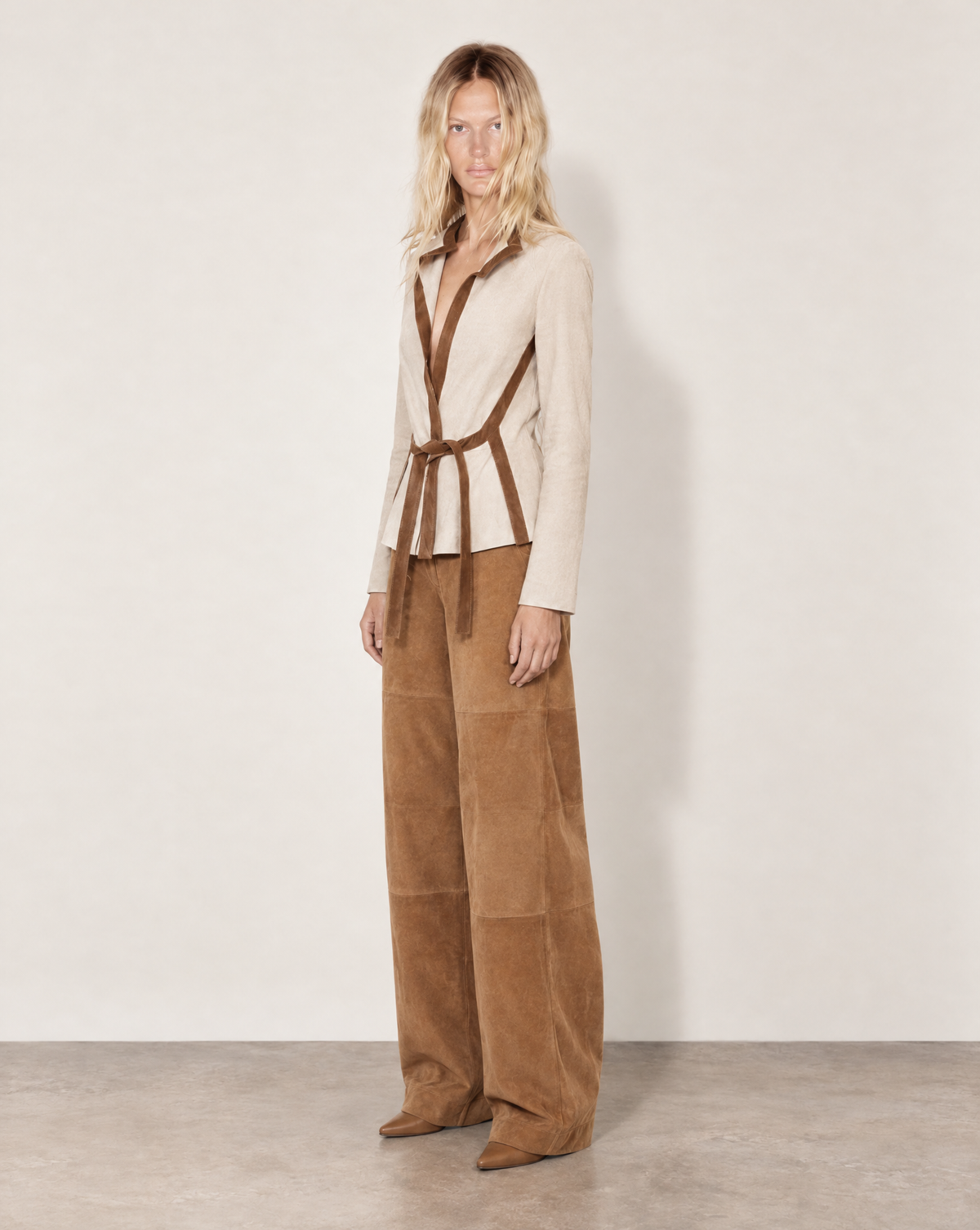 Close-up of the beige suede and chestnut leather used in this Valentino Garavani jacket from the Fall/Winter 2001 collection, showcasing its refined materials and tailored construction Mezzanorre Archival