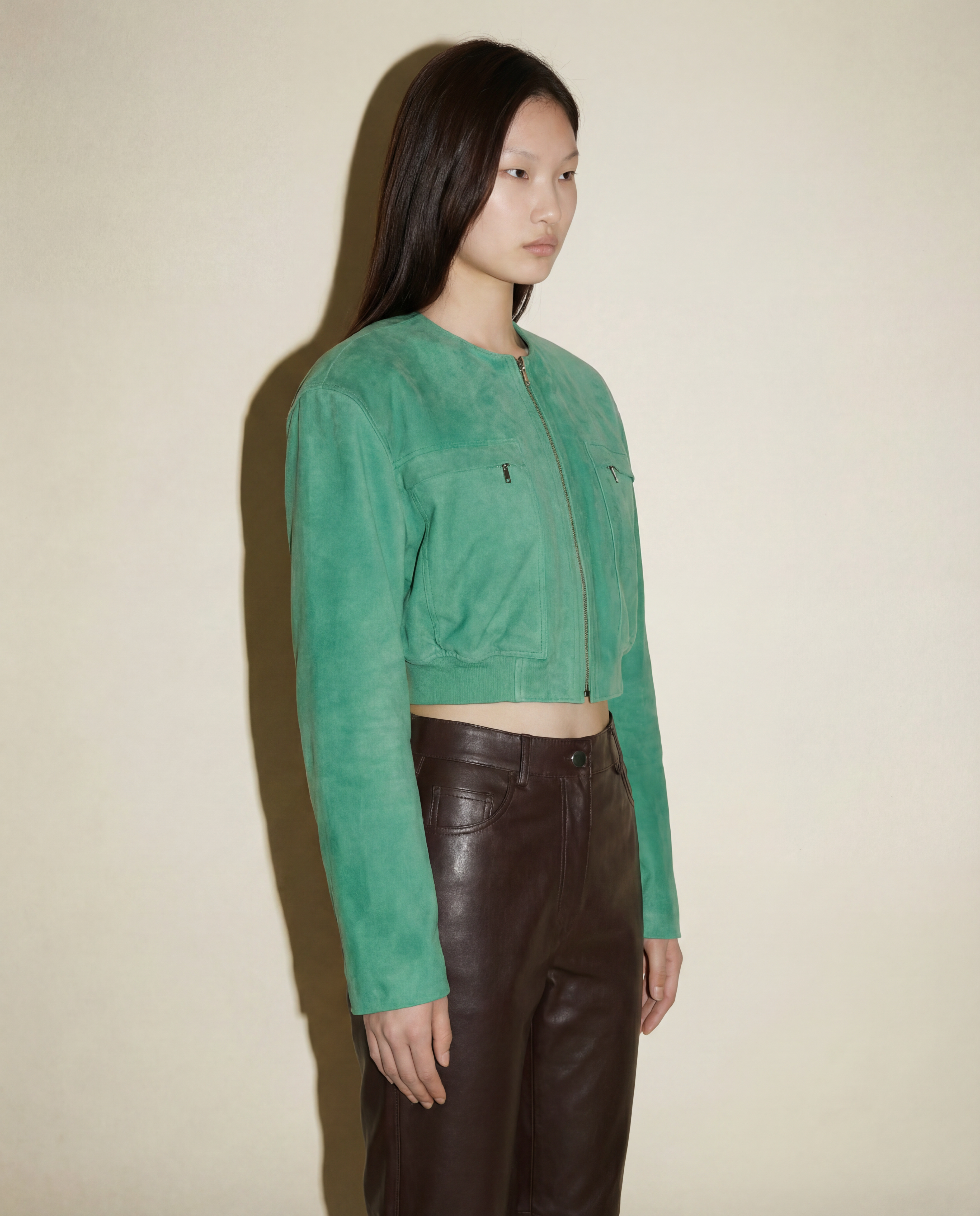 Versace 90s jacket with zip closure and structured suede finish
