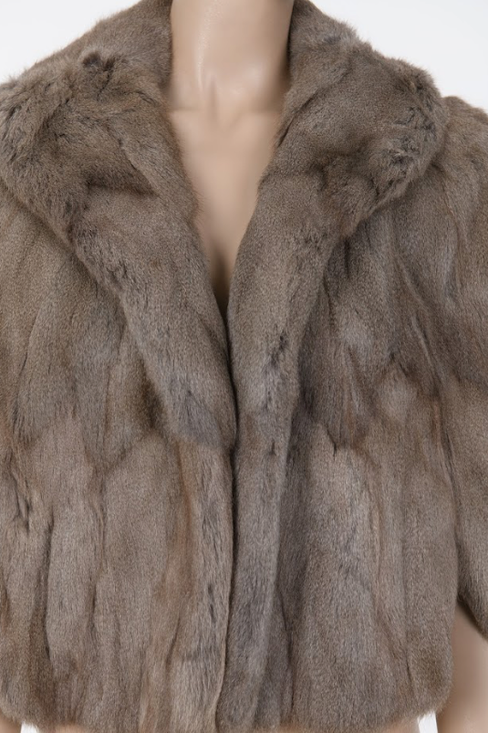Taupe mink fur jacket with rounded sleeves and plush texture mid century luxury coat