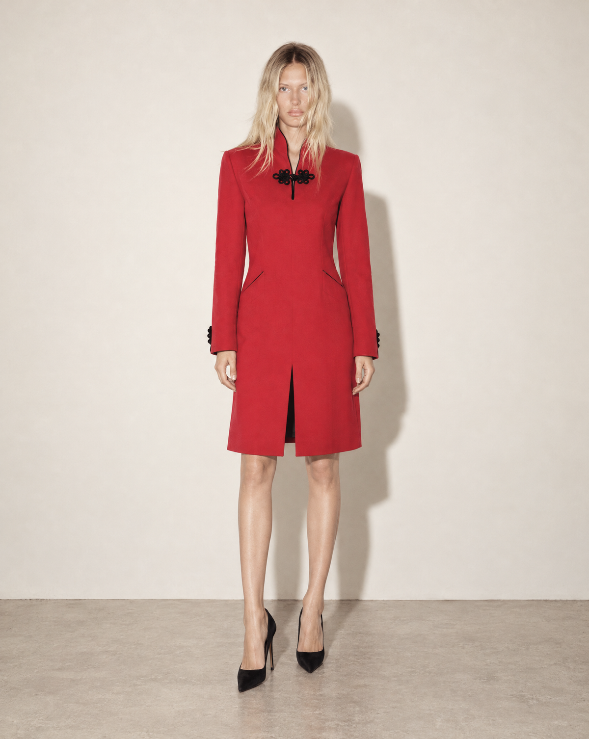 Red archival YSL dress with a Mandarin stand collar, softly structured shoulders and clean Parisian tailoring. Available to buy or enquire about renting from Mezzanotte Vintage in Madrid, with stylist pull enquiries welcome across Europe.