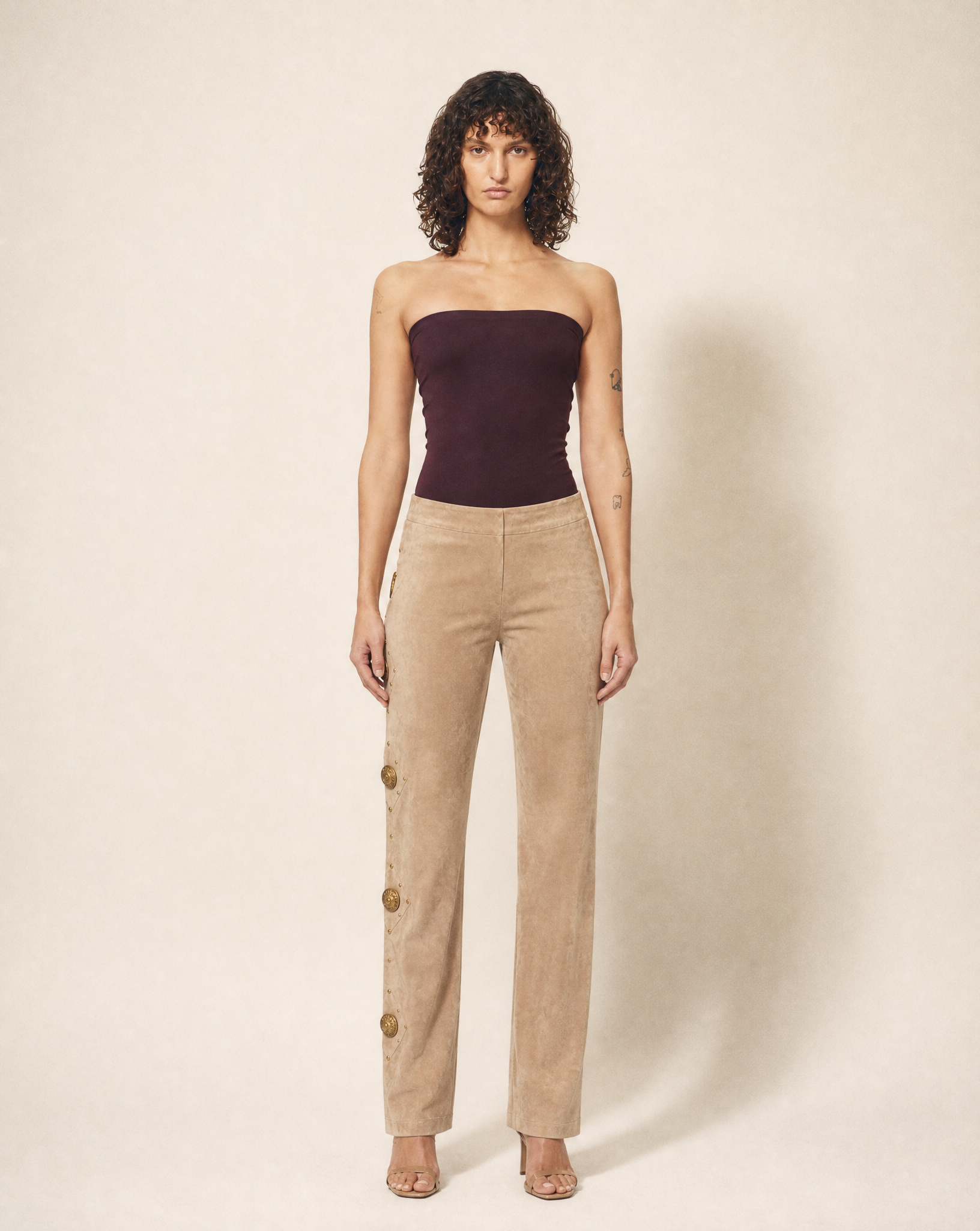Archival 1990s Gianni Versace Medusa suede trousers, available at Mezzanotte Madrid