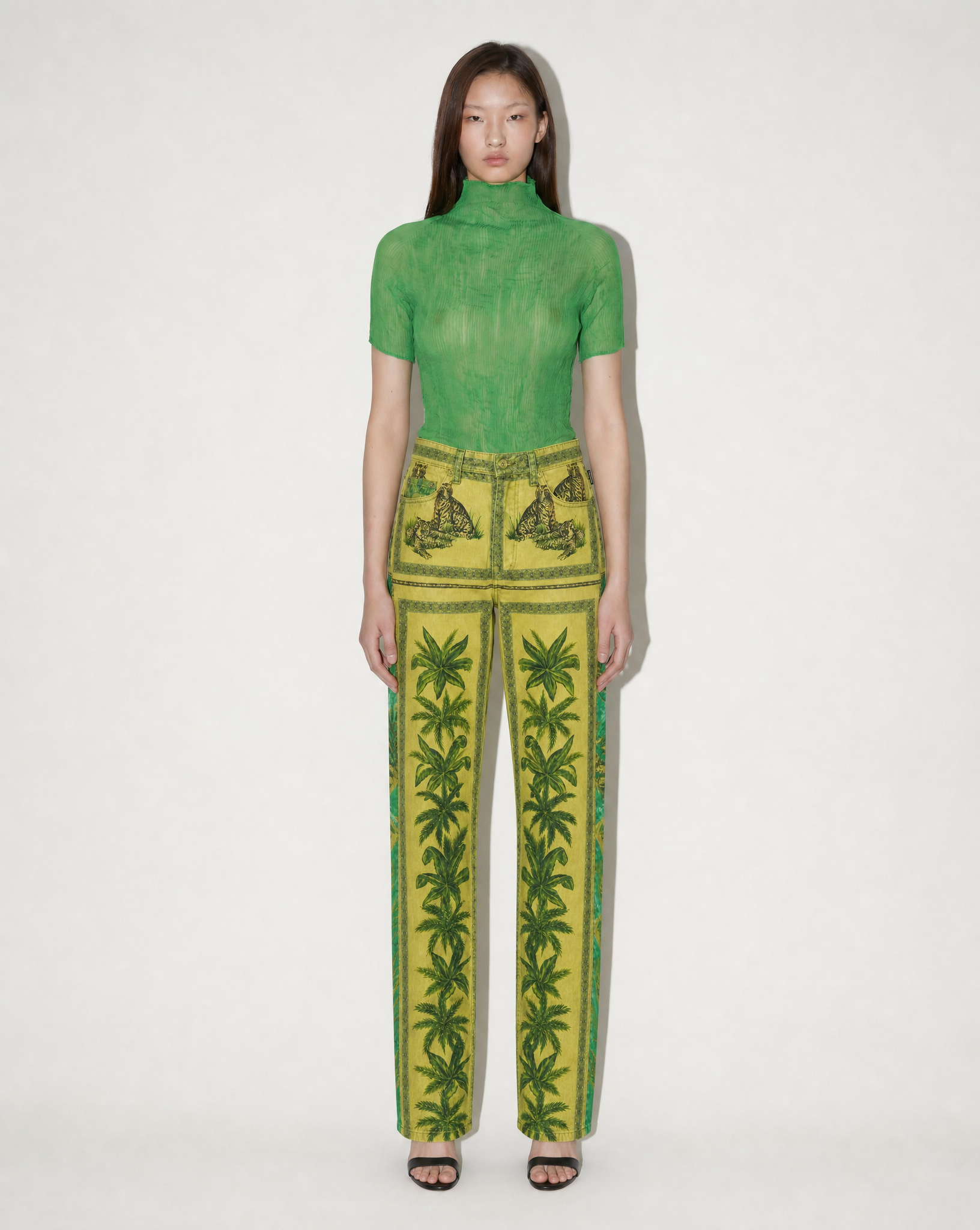 Archival 1993 Gianni Versace Tarzan jungle print trousers, available at Mezzanotte Madrid.