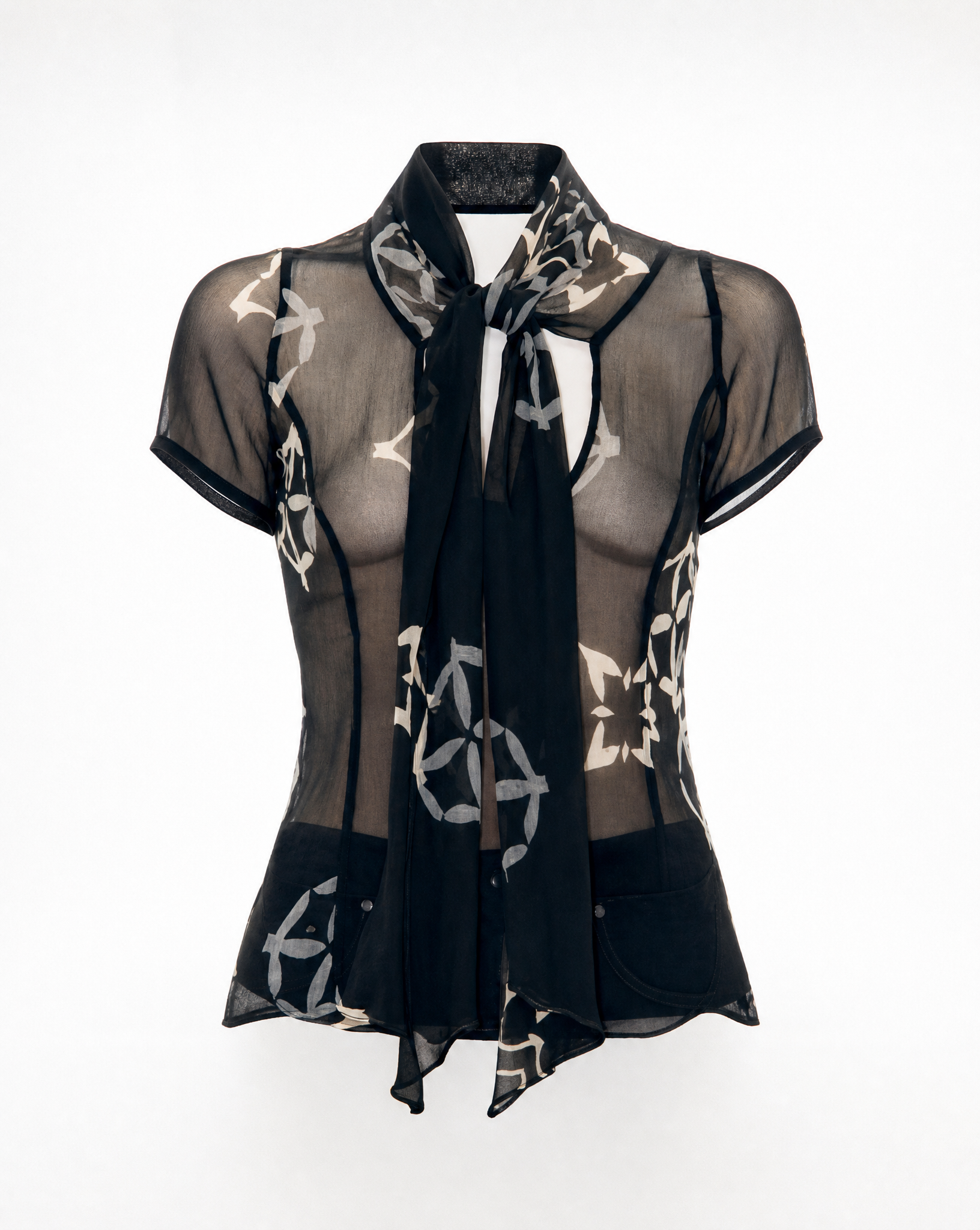 Back view of the vintage Armani Collezioni sheer silk chiffon blouse showcasing the semi-transparent construction and abstract floral print.