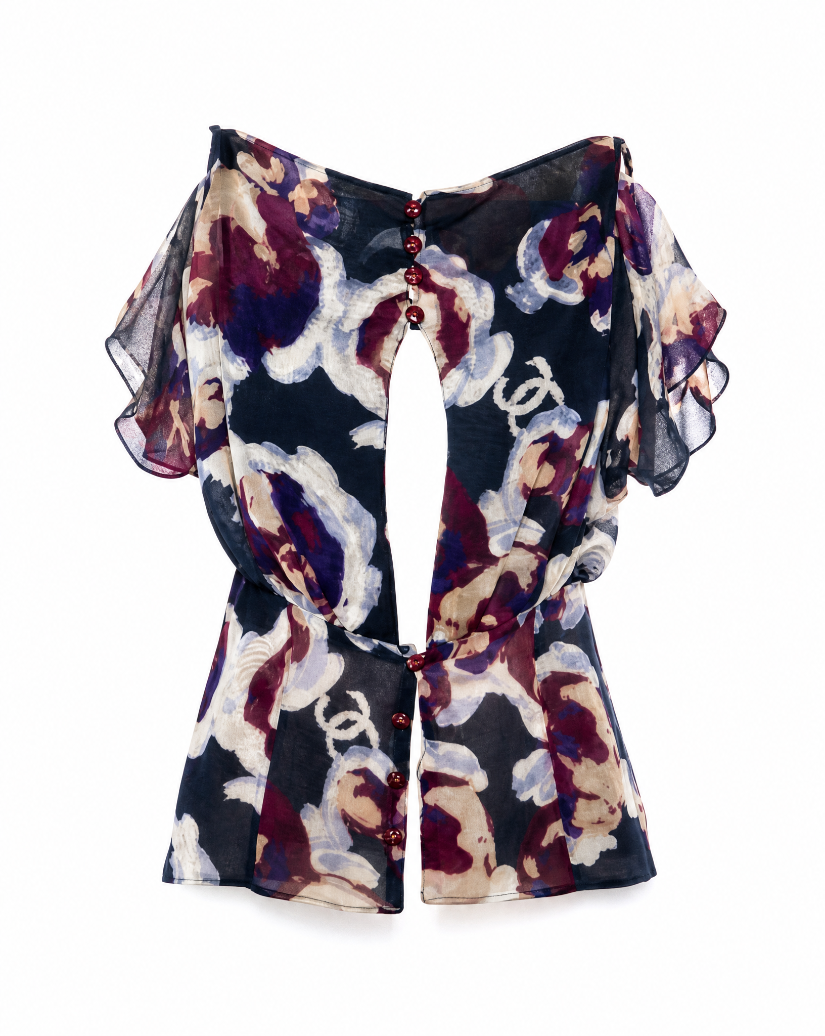 Detail of the keyhole neckline, decorative buttons and abstract floral CC print on a vintage Chanel silk chiffon blouse.