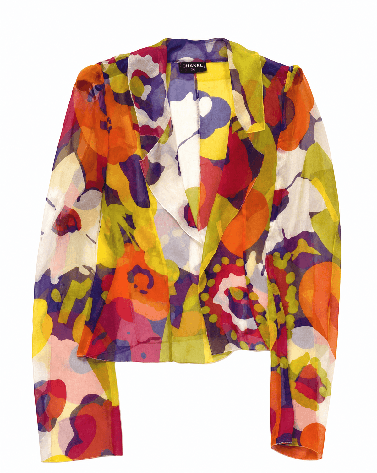 Back view of a vintage Chanel floral silk chiffon blouse from the Karl Lagerfeld era. Buy across Europe or rent in Madrid at Mezzanotte.
