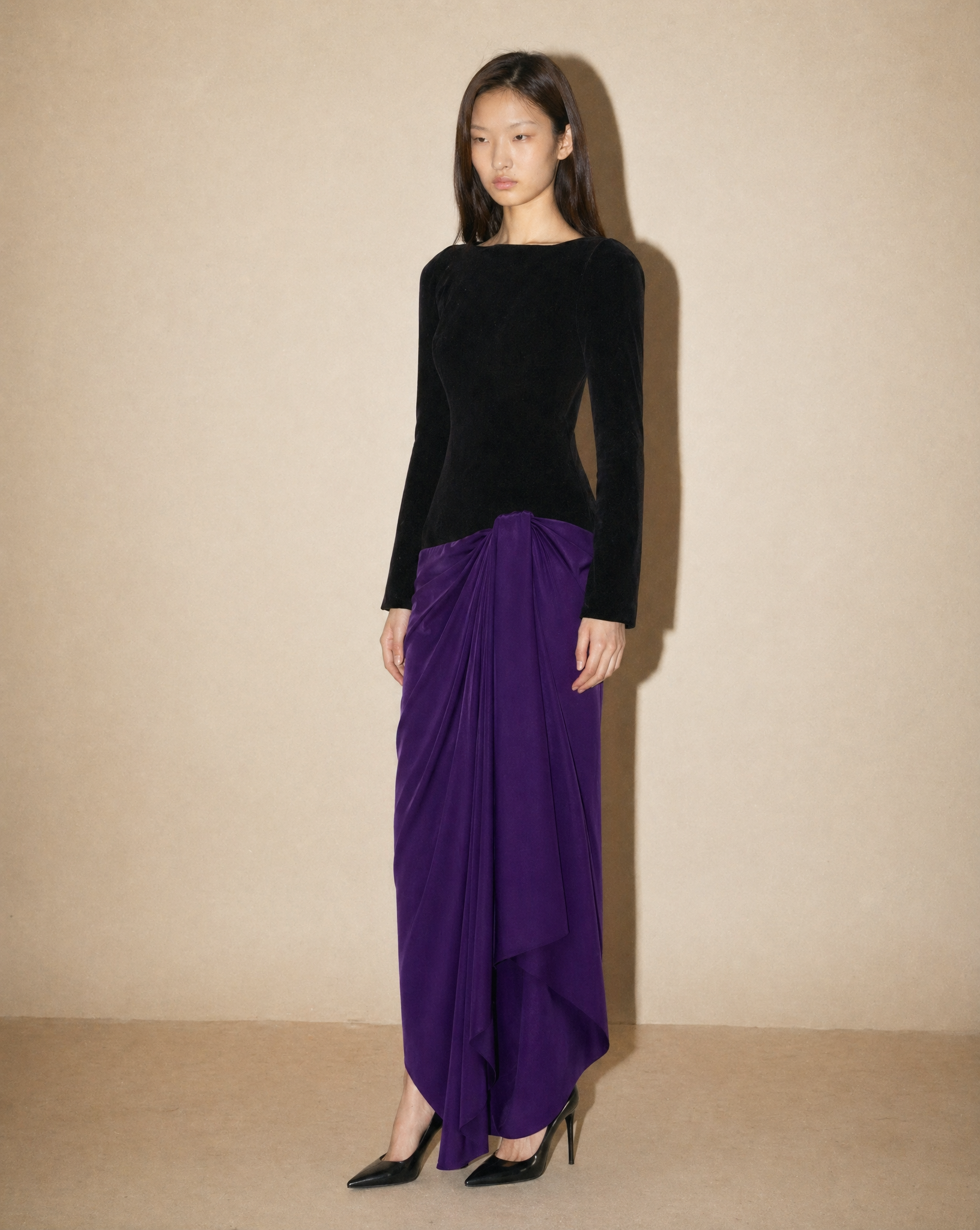 Christian Dior by John Galliano black and purple draped silk evening gown available for purchase and luxury rental across Europe from Mezzanotte.
