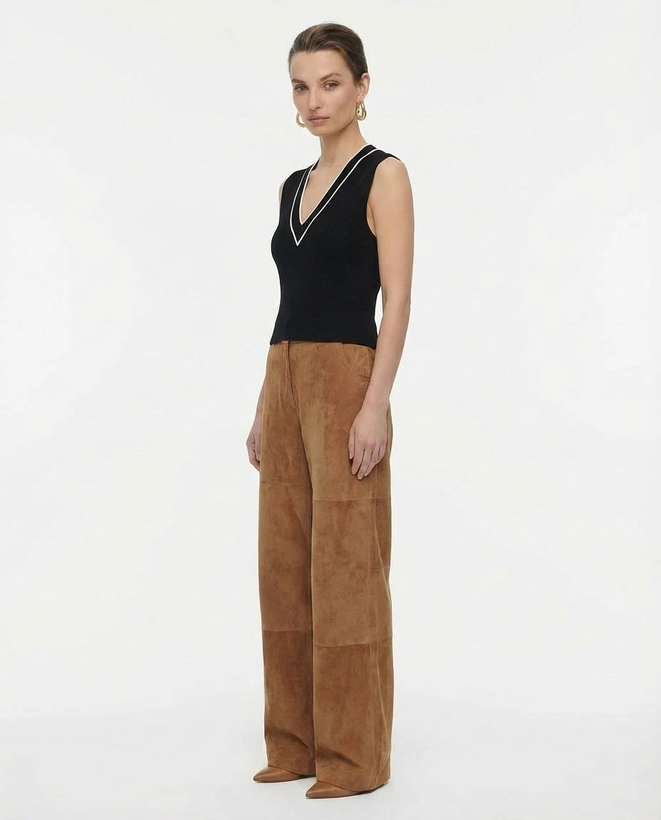 FRAME black sleeveless knit top with contrast white V-neck trim Mezzanotte Madrid