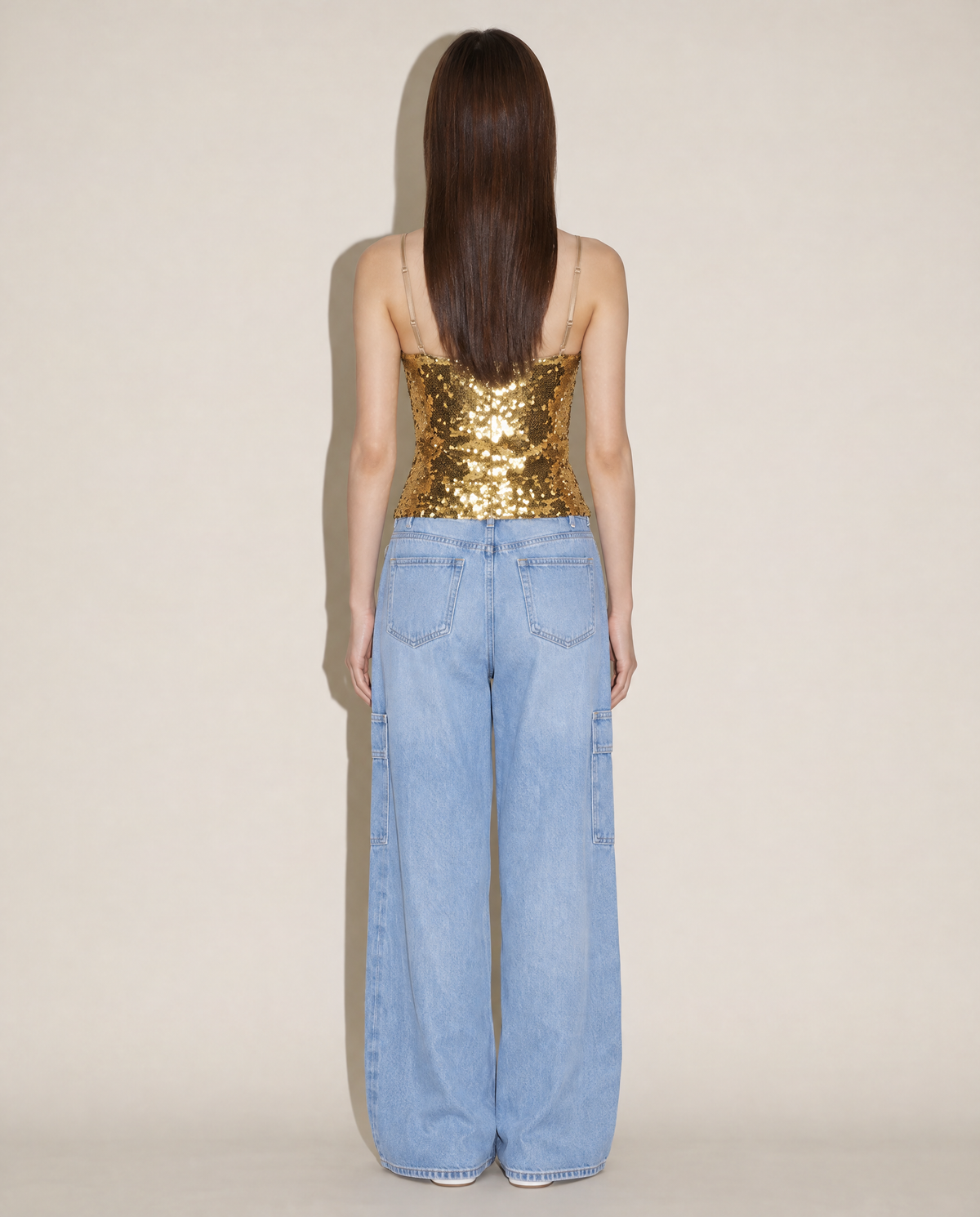 Archival Dolce & Gabbana early 2000s gold sequin corset styled on model. Rent in Madrid or buy across Europe at Mezzanotte Madrid